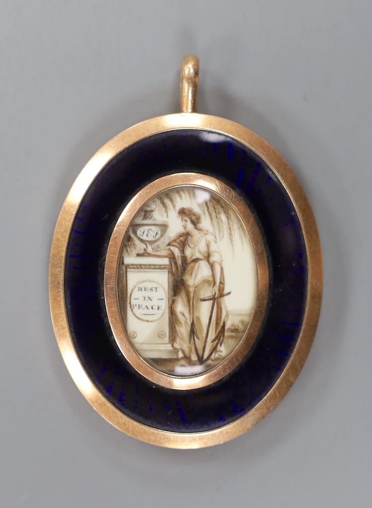A Regency yellow metal, blue guilloche enamel and plaited hair mourning pendant, with inset ivory panel of a lady by an urn inscribed 'Rest in Peace', 56mm